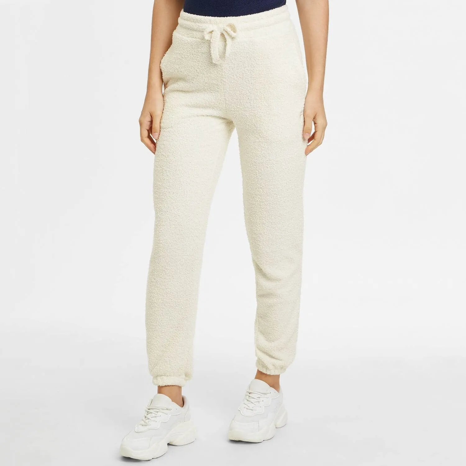 Dámske tepláky FILA CRERET high waist pants krémovo-biele