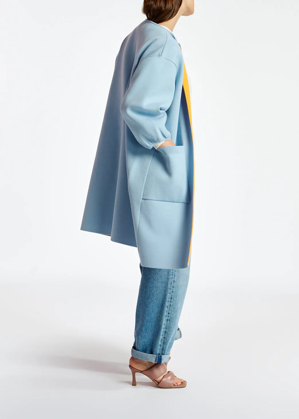 Light blue oversized knit coat